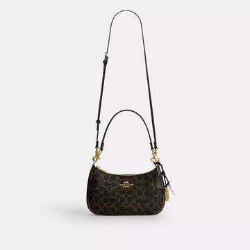 teri shoulder bag in loved signature canvas with charms