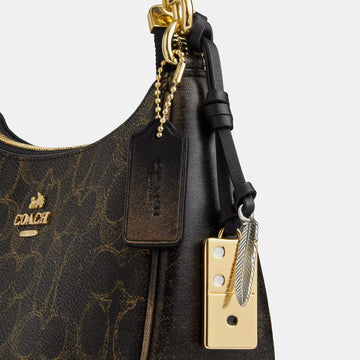 teri shoulder bag in loved signature canvas with charms